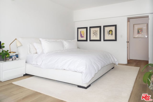 bedroom featuring light hardwood / wood-style floors