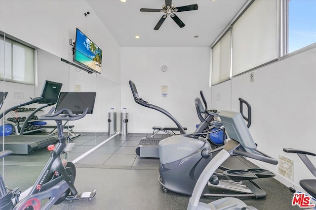 exercise room with ceiling fan