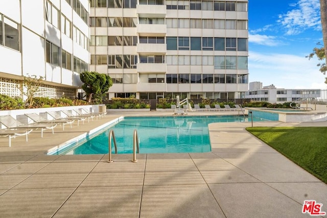 view of pool with a patio area