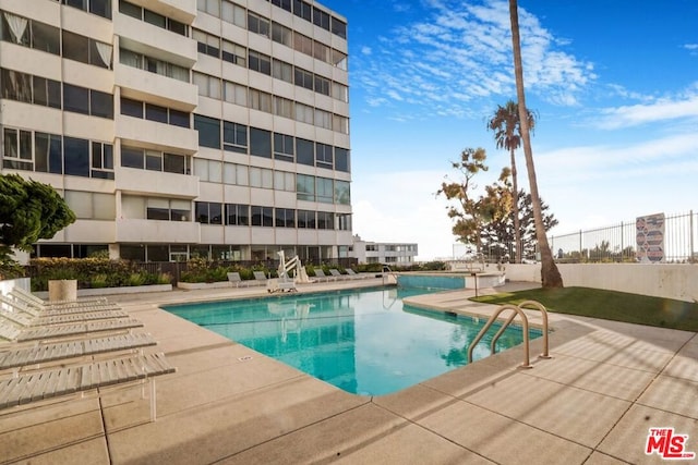 view of pool with a patio area