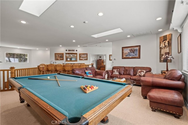 game room with bar area, light carpet, and billiards