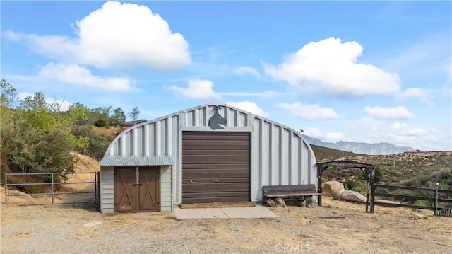 view of outdoor structure with a mountain view