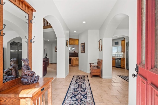 entrance foyer with light tile patterned floors