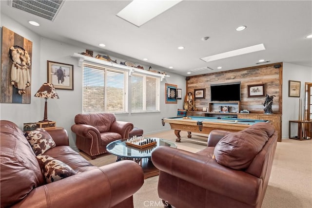 living room with light colored carpet and pool table