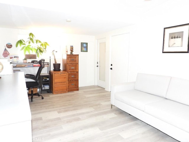 home office featuring light wood-style floors