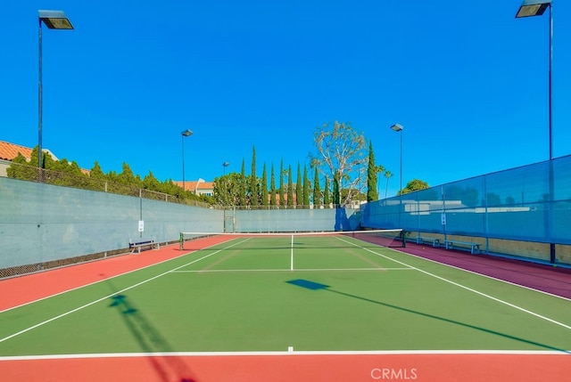 view of tennis court with basketball court