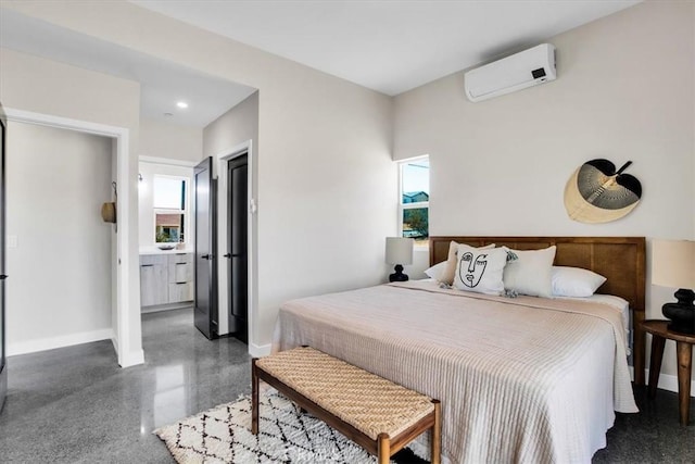 6614 Sunset Rd, Joshua Tree, CA 92252 - bedroom with baseboards, a wall unit AC, speckle patterned floor, and recessed lighting