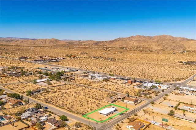 6614 Sunset Rd, Joshua Tree, CA 92252 - aerial view of sparsely populated area with a desert landscape, mountains, and property parcel outlined