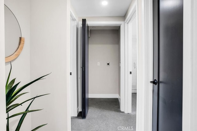 hallway with carpet