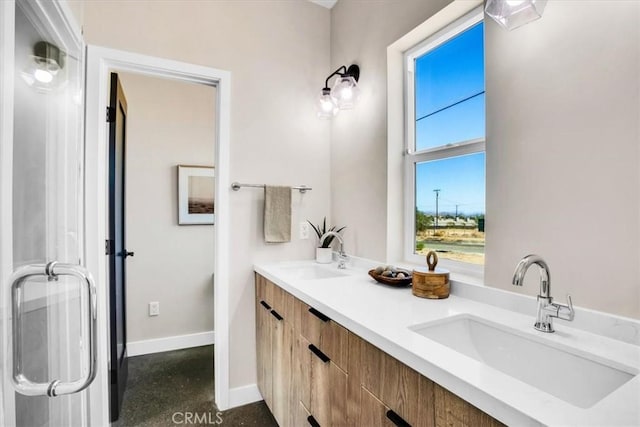 6614 Sunset Rd, Joshua Tree, CA 92252 - bathroom with double vanity and baseboards