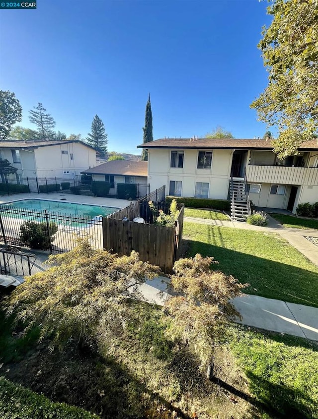 exterior space featuring a community pool