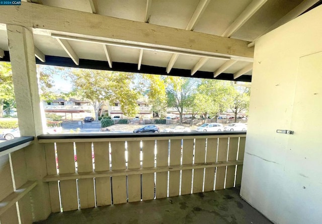 view of patio featuring a balcony