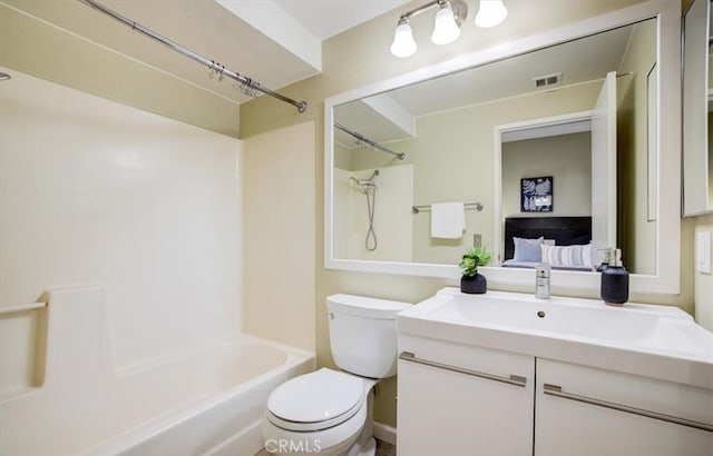 ensuite bathroom with vanity, toilet, visible vents,  shower combination, and ensuite bathroom