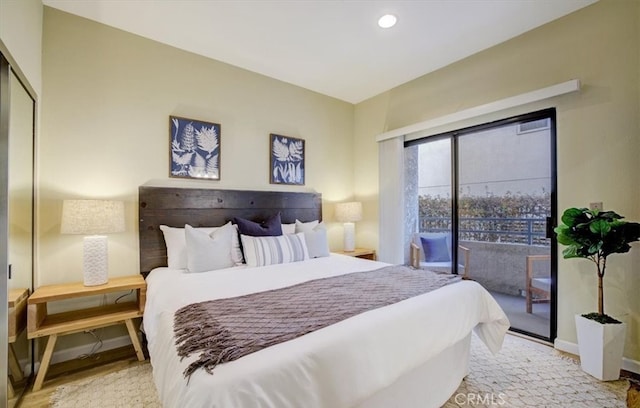 bedroom with wood finished floors, recessed lighting, access to exterior, and baseboards