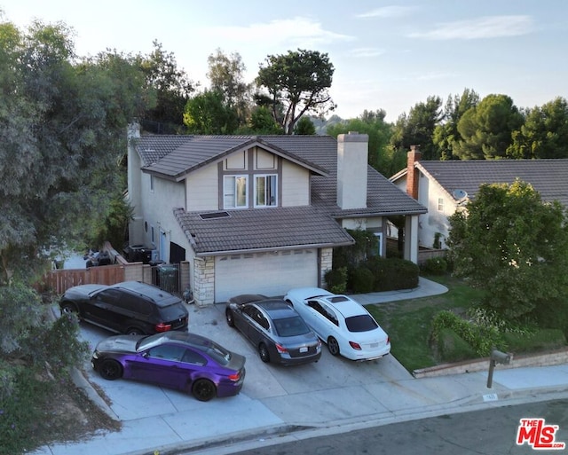 view of front of home with a garage