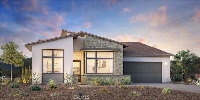 view of front of home featuring a garage