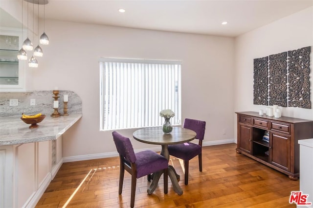 dining space featuring light hardwood / wood-style flooring