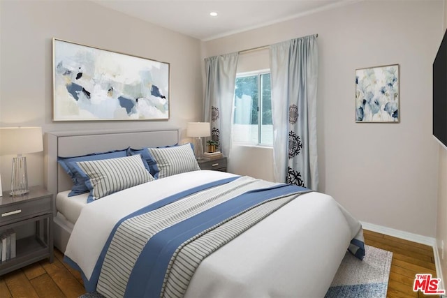 bedroom featuring hardwood / wood-style flooring