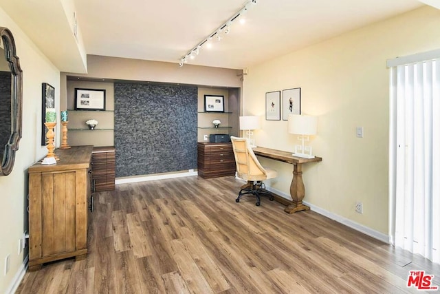 office area featuring hardwood / wood-style flooring and track lighting