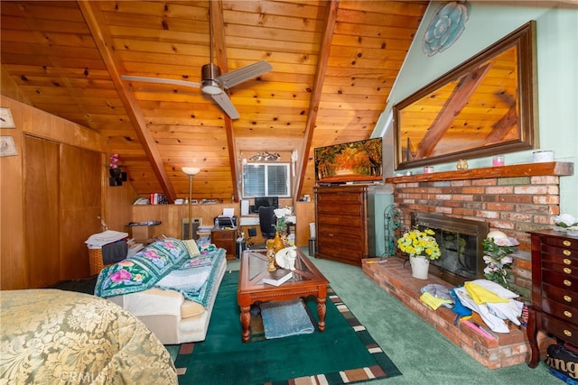 living room with vaulted ceiling with beams, wood ceiling, and carpet floors