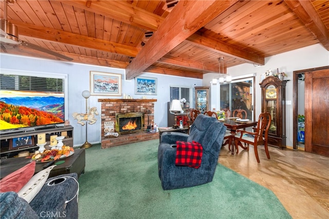 living room featuring wood ceiling, beamed ceiling, plenty of natural light, and a fireplace