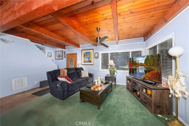 living room featuring wood ceiling, visible vents, a ceiling fan, beamed ceiling, and carpet