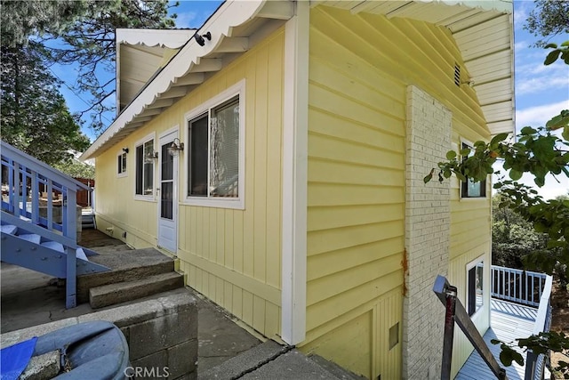 view of home's exterior with a deck