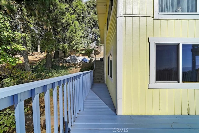 view of side of property with a deck