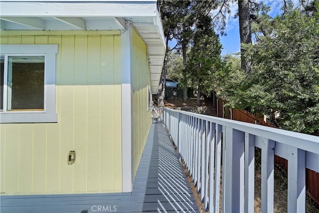 view of home's exterior featuring fence