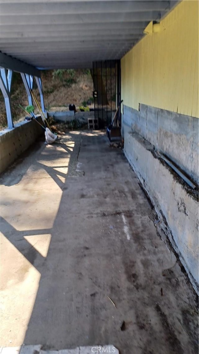 view of patio / terrace featuring an attached carport