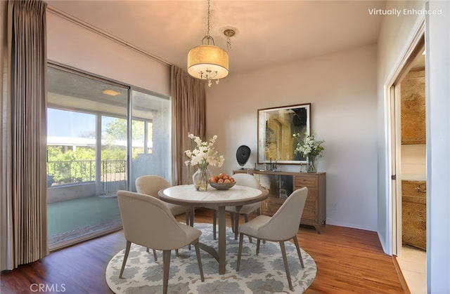 dining room with wood finished floors