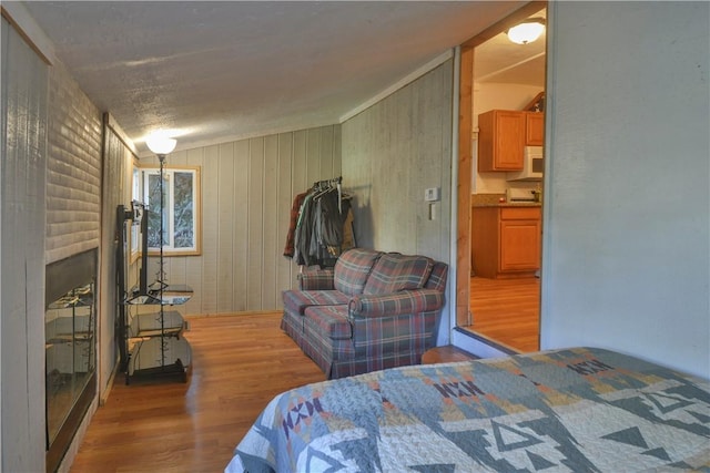 bedroom with hardwood / wood-style flooring