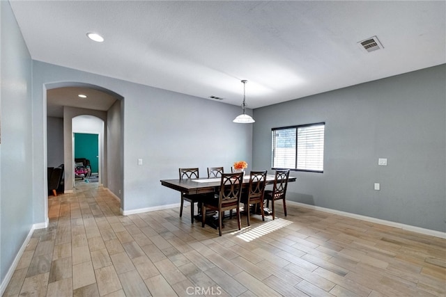 dining room featuring light hardwood / wood-style flooring