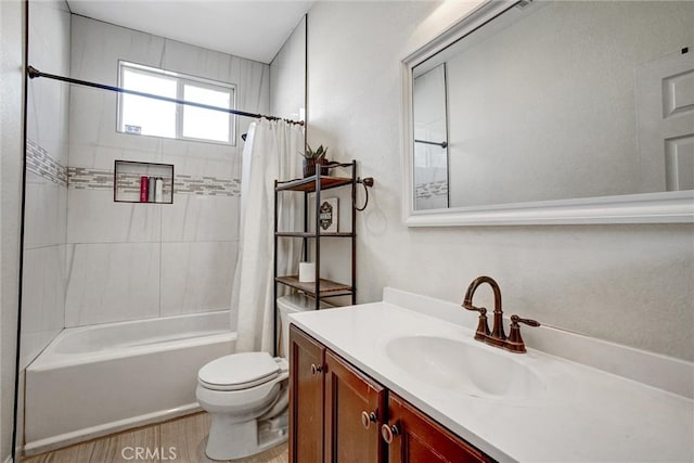 full bathroom featuring toilet, shower / tub combo, vanity, and wood-type flooring