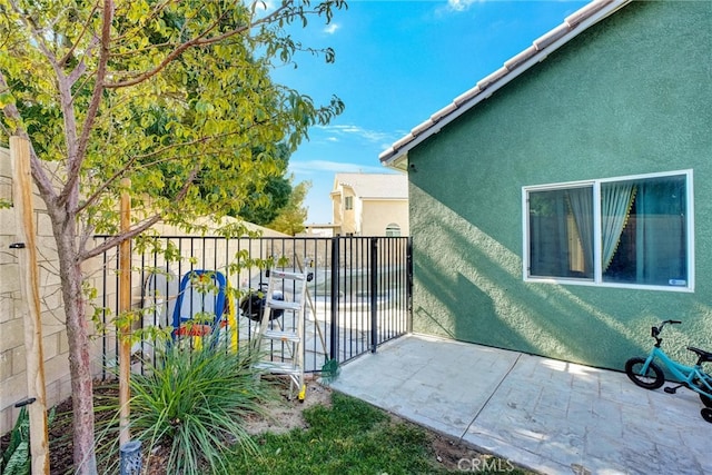 view of home's exterior with a patio