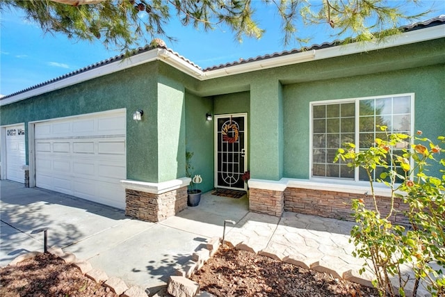 entrance to property with a garage