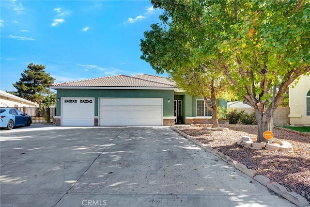 view of front of property with a garage