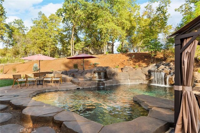 5772 Acorn Ridge Dr, Paradise, CA 95969 - view of swimming pool with a patio