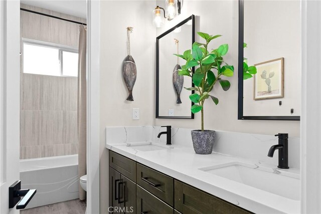 5772 Acorn Ridge Dr, Paradise, CA 95969 - full bathroom featuring double vanity, shower / tub combo with curtain, and wood finished floors