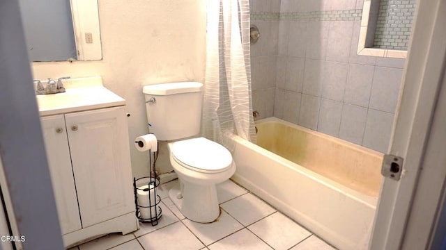 full bathroom featuring tile patterned flooring, shower / tub combo, vanity, and toilet