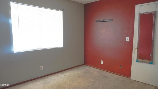 view of carpeted spare room