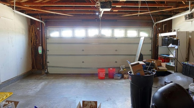 garage featuring a garage door opener