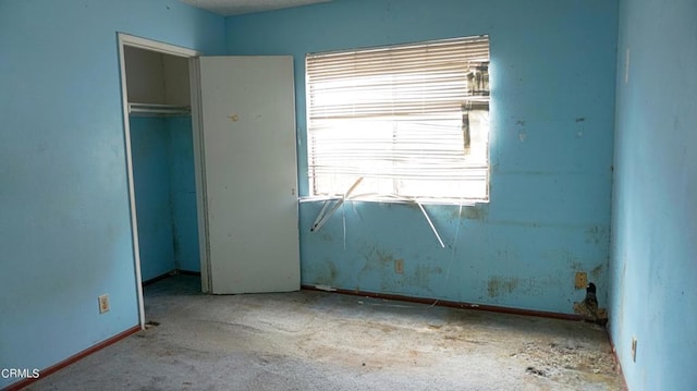 unfurnished bedroom featuring a closet