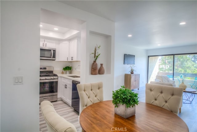 dining space featuring sink