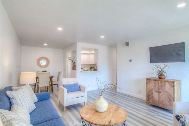 living room featuring light hardwood / wood-style flooring