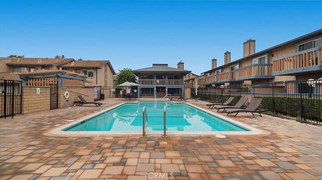 view of swimming pool featuring a patio