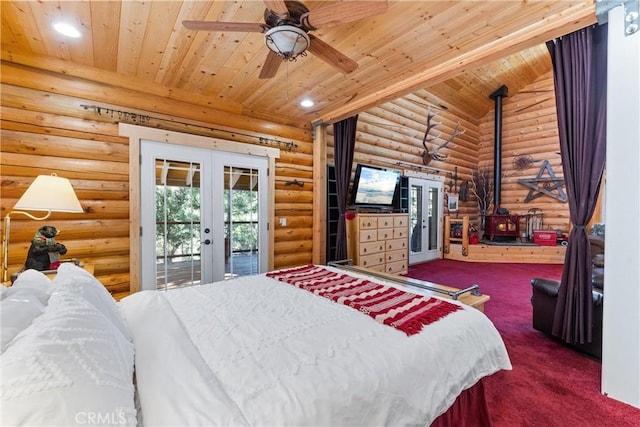 carpeted bedroom with lofted ceiling, a wood stove, access to outside, wooden ceiling, and french doors