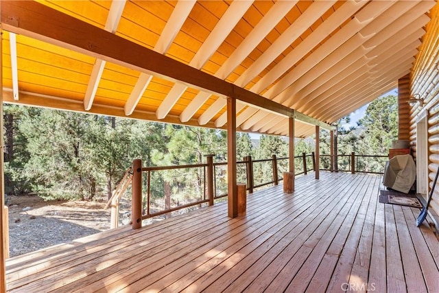 wooden terrace with grilling area