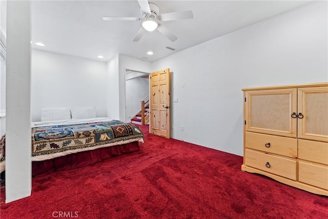 carpeted bedroom featuring ceiling fan