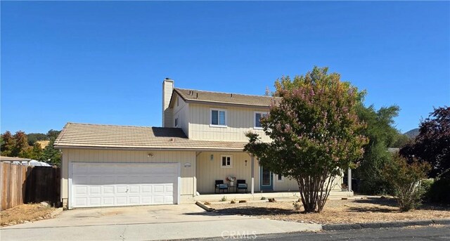 front of property with a garage